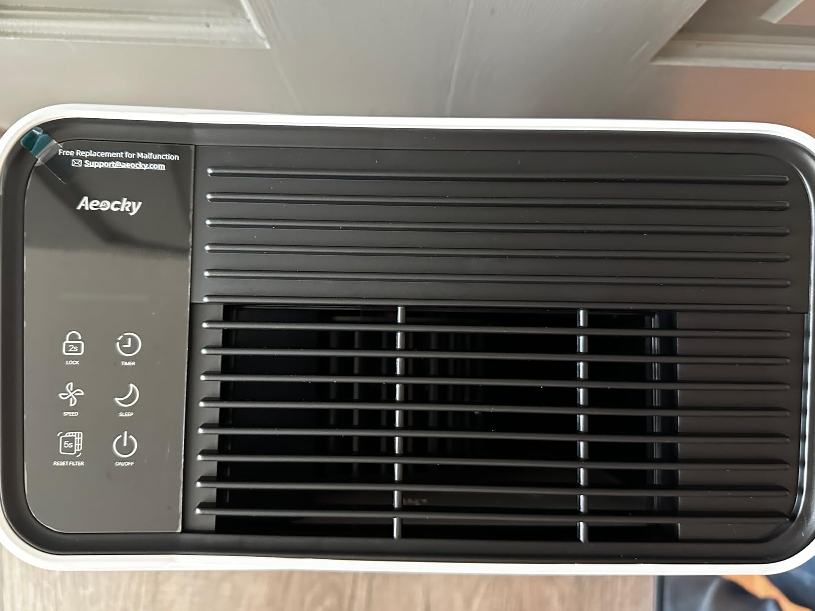 AEOCKY Air Purifier top view showing filter design